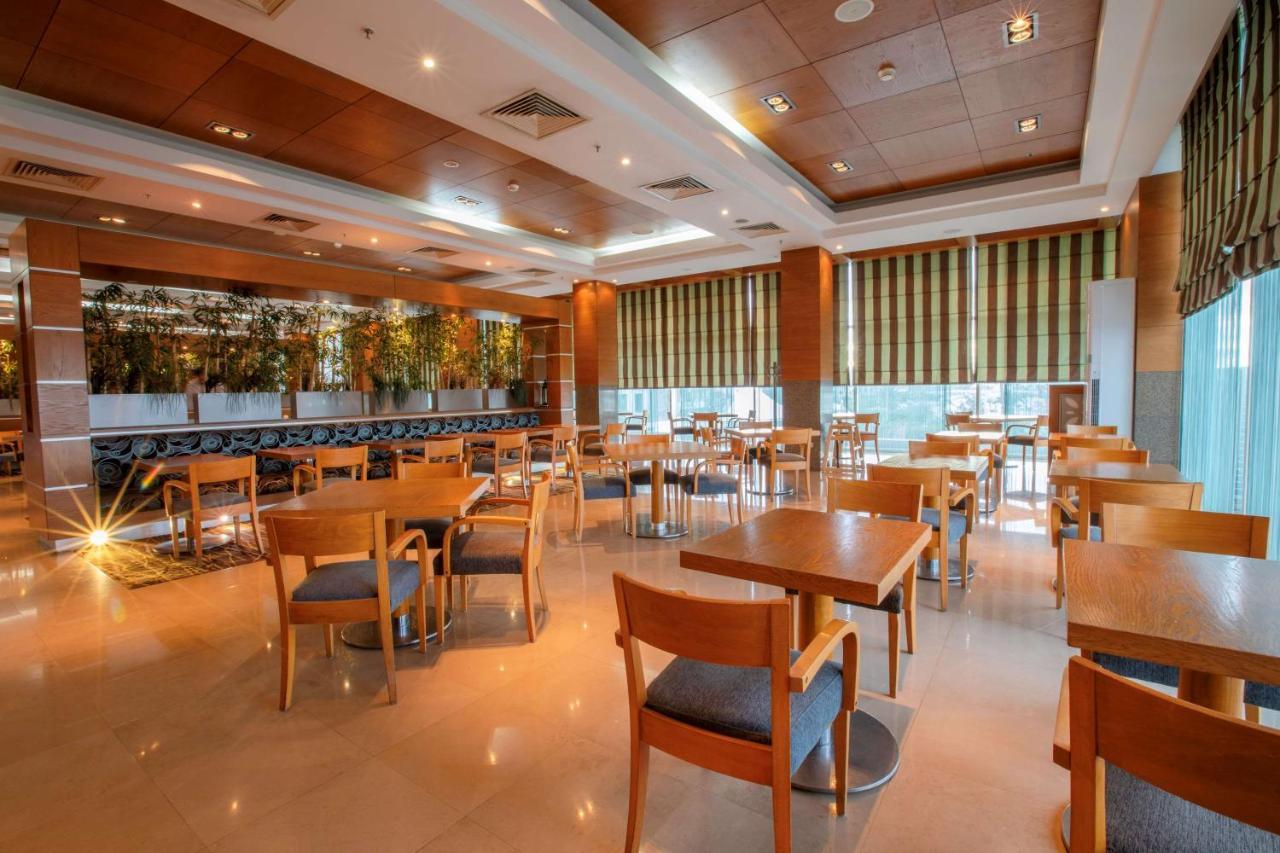 Al Mahary Radisson Blu Hotel, Tripoli Esterno foto